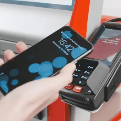 a payment happening at a photo printer of CEWE