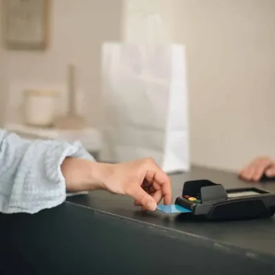 A payment happening at a cash desk of Tchibo
