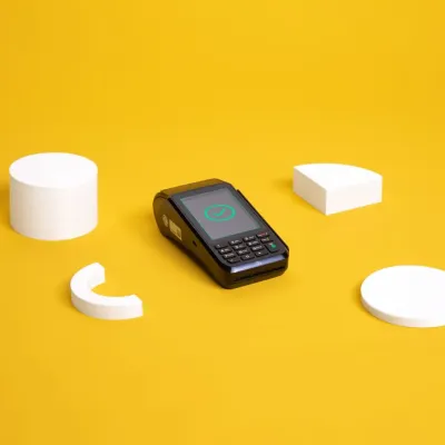 the mobile payment terminal CCV Mobile Premium on yellow background the mobile payment terminal CCV Mobile Premium on yellow background